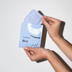 Rest Self Heating Warm Compresses Hands hold mask and packet